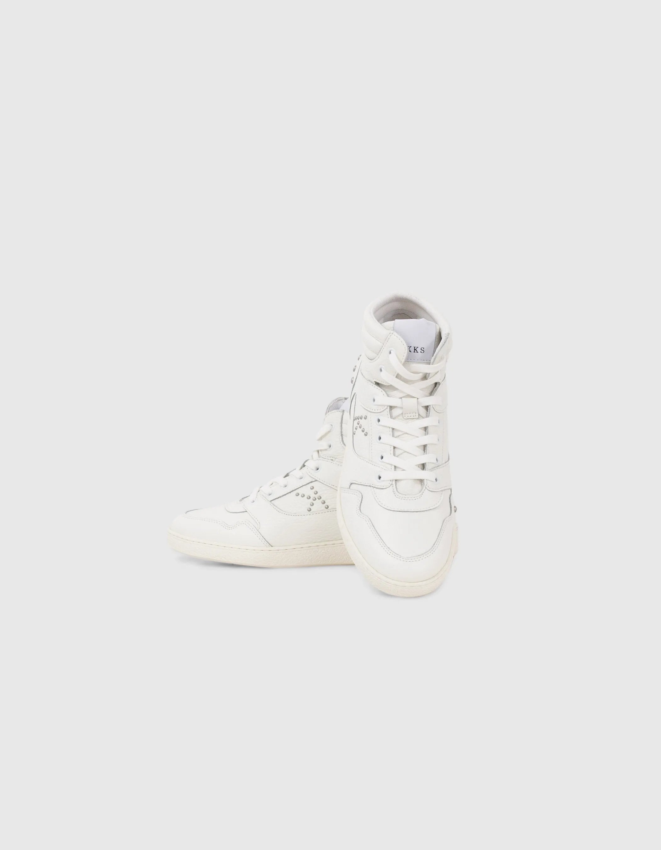 Sneakers blanches cuir décor clous Femme